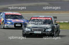 07.08.2005 Nürburg, Germany,  Mika Häkkinen (FIN), Sport Edition AMG-Mercedes, AMG-Mercedes C-Klasse, leads Mattias Ekström (SWE), Audi Sport Team Abt Sportsline, Audi A4 DTM - DTM 2005 at Nürburgring (Deutsche Tourenwagen Masters)