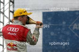 07.08.2005 Nürburg, Germany,  Podium, Mattias Ekström (SWE), Audi Sport Team Abt Sportsline, Portrait (1st), spraying champaign - DTM 2005 at Nürburgring (Deutsche Tourenwagen Masters)