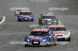 07.08.2005 Nürburg, Germany,  Mattias Ekström (SWE), Audi Sport Team Abt Sportsline, Audi A4 DTM, leads Bernd Schneider (GER), Vodafone AMG-Mercedes, AMG-Mercedes C-Klasse, Laurent Aiello (FRA), Opel Performance Center, Opel Vectra GTS V8, Martin Tomczyk (GER), Audi Sport Team Abt Sportsline, Audi A4 DTM and Tom Kristensen (DNK), Audi Sport Team Abt, Audi A4 DTM - DTM 2005 at Nürburgring (Deutsche Tourenwagen Masters)