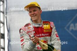 07.08.2005 Nürburg, Germany,  Podium, Mattias Ekström (SWE), Audi Sport Team Abt Sportsline, Portrait (1st), spraying champaign - DTM 2005 at Nürburgring (Deutsche Tourenwagen Masters)