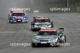 07.08.2005 Nürburg, Germany,  Gary Paffett (GBR), DaimlerChrysler Bank AMG-Mercedes, AMG-Mercedes C-Klasse, leads Mika Häkkinen (FIN), Sport Edition AMG-Mercedes, AMG-Mercedes C-Klasse, Mattias Ekström (SWE), Audi Sport Team Abt Sportsline, Audi A4 DTM and Bernd Schneider (GER), Vodafone AMG-Mercedes, AMG-Mercedes C-Klasse - DTM 2005 at Nürburgring (Deutsche Tourenwagen Masters)