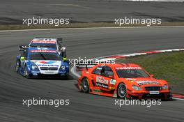 07.08.2005 Nürburg, Germany,  Alexandros Margaritis (GRC), Mücke Motorsport, AMG-Mercedes C-Klasse, leads Manuel Reuter (GER), Opel Performance Center, Opel Vectra GTS V8 and Bruno Spengler (CDN), Junge Gebrauchte von Mercedes, AMG-Mercedes C-Klasse - DTM 2005 at Nürburgring (Deutsche Tourenwagen Masters)