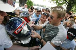 15.07.2005 Nürnberg, Germany,  Mika Häkkinen (FIN), Sport Edition AMG-Mercedes, AMG-Mercedes C-Klasse, crossling the finish line - DTM 2005 at Norisring (Deutsche Tourenwagen Masters)