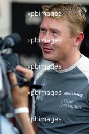 15.07.2005 Nürnberg, Germany,  Mika Häkkinen (FIN), Sport Edition AMG-Mercedes, AMG-Mercedes C-Klasse, crossling the finish line - DTM 2005 at Norisring (Deutsche Tourenwagen Masters)