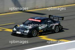 15.07.2005 Nürnberg, Germany,  Mika Häkkinen (FIN), Sport Edition AMG-Mercedes, AMG-Mercedes C-Klasse, crossling the finish line - DTM 2005 at Norisring (Deutsche Tourenwagen Masters)