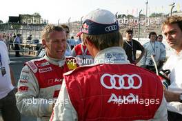 16.07.2005 Nürnberg, Germany,  Tom Kristensen (DNK), Audi Sport Team Abt, Portrait, pole position, and Mattias Ekström (SWE), Audi Sport Team Abt Sportsline, Portrait, chat after the super pole qualitying - DTM 2005 at Norisring (Deutsche Tourenwagen Masters)