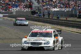 16.07.2005 Nürnberg, Germany,  Jamie Green (GBR), Salzgitter AMG-Mercedes, AMG-Mercedes C-Klasse, in front of Gary Paffett (GBR), DaimlerChrysler Bank AMG-Mercedes, AMG-Mercedes C-Klasse - DTM 2005 at Norisring (Deutsche Tourenwagen Masters)