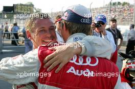 16.07.2005 Nürnberg, Germany,  Mattias Ekström (SWE), Audi Sport Team Abt Sportsline, Portrait (seen from the rear) congratulates Tom Kristensen (DNK), Audi Sport Team Abt, Portrait with his pole position - DTM 2005 at Norisring (Deutsche Tourenwagen Masters)