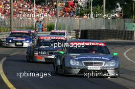 17.07.2005 Nürnberg, Germany,  Gary Paffett (GBR), DaimlerChrysler Bank AMG-Mercedes, AMG-Mercedes C-Klasse, leads Christian Abt (GER), Audi Sport Team Joest Racing, Audi A4 DTM and Mattias Ekström (SWE), Audi Sport Team Abt Sportsline, Audi A4 DTM - DTM 2005 at Norisring (Deutsche Tourenwagen Masters)