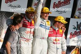 17.07.2005 Nürnberg, Germany,  Podium, Gary Paffett (GBR), DaimlerChrysler Bank AMG-Mercedes, Portrait (1st, center), Christian Abt (GER), Audi Sport Team Joest Racing, Portrait (2nd, left) and Mattias Ekström (SWE), Audi Sport Team Abt Sportsline, Portrait (3rd, right) - DTM 2005 at Norisring (Deutsche Tourenwagen Masters)