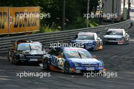 17.07.2005 Nürnberg, Germany,  Marcel Fässler (SUI), Opel Performance Center, Opel Vectra GTS V8, leads Laurent Aiello (FRA), Opel Performance Center, Opel Vectra GTS V8, Martin Tomczyk (GER), Audi Sport Team Abt Sportsline, Audi A4 DTM and Christian Abt (GER), Audi Sport Team Joest Racing, Audi A4 DTM - DTM 2005 at Norisring (Deutsche Tourenwagen Masters)