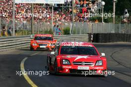 17.07.2005 Nürnberg, Germany,  Heinz-Harald Frentzen (GER), Opel Performance Center, Opel Vectra GTS V8, leads Alexandros Margaritis (GRC), Mücke Motorsport, AMG-Mercedes C-Klasse - DTM 2005 at Norisring (Deutsche Tourenwagen Masters)