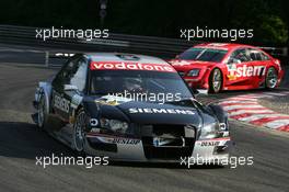 17.07.2005 Nürnberg, Germany,  Allan McNish (GBR), Audi Sport Team Abt, Audi A4 DTM, leads Heinz-Harald Frentzen (GER), Opel Performance Center, Opel Vectra GTS V8 - DTM 2005 at Norisring (Deutsche Tourenwagen Masters)