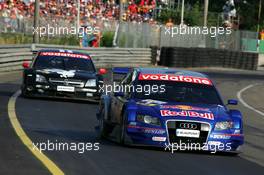 17.07.2005 Nürnberg, Germany,  Martin Tomczyk (GER), Audi Sport Team Abt Sportsline, Audi A4 DTM, leads Laurent Aiello (FRA), Opel Performance Center, Opel Vectra GTS V8 - DTM 2005 at Norisring (Deutsche Tourenwagen Masters)