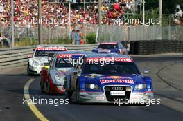 17.07.2005 Nürnberg, Germany,  Mattias Ekström (SWE), Audi Sport Team Abt Sportsline, Audi A4 DTM, leads Bernd Schneider (GER), Vodafone AMG-Mercedes, AMG-Mercedes C-Klasse, Bruno Spengler (CDN), Junge Gebrauchte von Mercedes, AMG-Mercedes C-Klasse and Martin Tomczyk (GER), Audi Sport Team Abt Sportsline, Audi A4 DTM - DTM 2005 at Norisring (Deutsche Tourenwagen Masters)