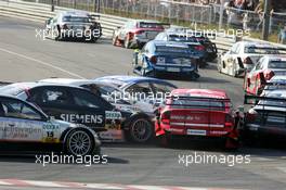 17.07.2005 Nürnberg, Germany,  Accident with Heinz-Harald Frentzen (GER), Opel Performance Center, Opel Vectra GTS V8, and Allan McNish (GBR), Audi Sport Team Abt, Audi A4 DTM, at the first corner - DTM 2005 at Norisring (Deutsche Tourenwagen Masters)