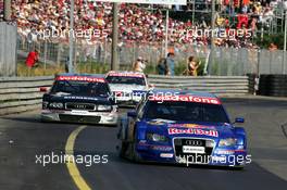 17.07.2005 Nürnberg, Germany,  Martin Tomczyk (GER), Audi Sport Team Abt Sportsline, Audi A4 DTM, leads Rinaldo Capello (ITA), Audi Sport Team Joest, Audi A4 DTM and Bruno Spengler (CDN), Junge Gebrauchte von Mercedes, AMG-Mercedes C-Klasse - DTM 2005 at Norisring (Deutsche Tourenwagen Masters)