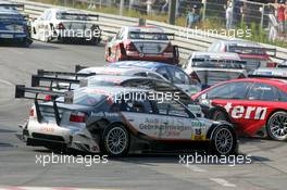 17.07.2005 Nürnberg, Germany,  Accident at the first corner between Heinz-Harald Frentzen (GER), Opel Performance Center, Opel Vectra GTS V8 and Allan McNish (GBR), Audi Sport Team Abt, Audi A4 DTM - DTM 2005 at Norisring (Deutsche Tourenwagen Masters)