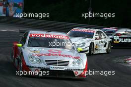 17.07.2005 Nürnberg, Germany,  Bernd Schneider (GER), Vodafone AMG-Mercedes, AMG-Mercedes C-Klasse, leads Bruno Spengler (CDN), Junge Gebrauchte von Mercedes, AMG-Mercedes C-Klasse and Laurent Aiello (FRA), Opel Performance Center, Opel Vectra GTS V8 - DTM 2005 at Norisring (Deutsche Tourenwagen Masters)