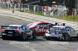 17.07.2005 Nürnberg, Germany,  Accident at the first corner between Heinz-Harald Frentzen (GER), Opel Performance Center, Opel Vectra GTS V8 and Allan McNish (GBR), Audi Sport Team Abt, Audi A4 DTM - DTM 2005 at Norisring (Deutsche Tourenwagen Masters)