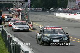 17.07.2005 Nürnberg, Germany,  Mika Häkkinen (FIN), Sport Edition AMG-Mercedes, AMG-Mercedes C-Klasse, driving out of the pitlane - DTM 2005 at Norisring (Deutsche Tourenwagen Masters)