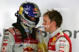 24.06.2005 Oschersleben, Germany,  Mattias Ekström (SWE), Audi Sport Team Abt Sportsline, Portrait (right), talking with Martin Tomczyk (GER), Audi Sport Team Abt Sportsline, Portrait (left) - DTM 2005 at Motopark Oschersleben (Deutsche Tourenwagen Masters)