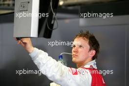 24.06.2005 Oschersleben, Germany,  Mattias Ekström (SWE), Audi Sport Team Abt Sportsline, Portrait, checking the laptimes on a monitor - DTM 2005 at Motopark Oschersleben (Deutsche Tourenwagen Masters)