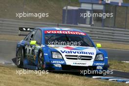 24.06.2005 Oschersleben, Germany,  Manuel Reuter (GER), Opel Performance Center, Opel Vectra GTS V8, going wide, over the curbestones - DTM 2005 at Motopark Oschersleben (Deutsche Tourenwagen Masters)