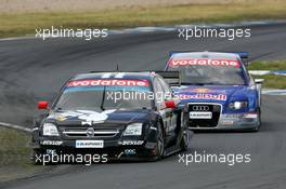 26.06.2005 Oschersleben, Germany,  Laurent Aiello (FRA), Opel Performance Center, Opel Vectra GTS V8, leads Mattias Ekström (SWE), Audi Sport Team Abt Sportsline, Audi A4 DTM - DTM 2005 at Motopark Oschersleben (Deutsche Tourenwagen Masters)