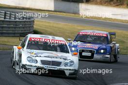 26.06.2005 Oschersleben, Germany,  Jamie Green (GBR), Salzgitter AMG-Mercedes, AMG-Mercedes C-Klasse, leads Mattias Ekström (SWE), Audi Sport Team Abt Sportsline, Audi A4 DTM - DTM 2005 at Motopark Oschersleben (Deutsche Tourenwagen Masters)