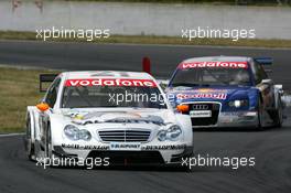 26.06.2005 Oschersleben, Germany,  Jamie Green (GBR), Salzgitter AMG-Mercedes, AMG-Mercedes C-Klasse, leads Mattias Ekström (SWE), Audi Sport Team Abt Sportsline, Audi A4 DTM - DTM 2005 at Motopark Oschersleben (Deutsche Tourenwagen Masters)