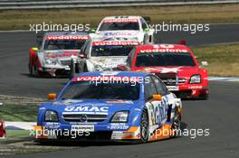 26.06.2005 Oschersleben, Germany,  Marcel Fässler (SUI), Opel Performance Center, Opel Vectra GTS V8, leads Heinz-Harald Frentzen (GER), Opel Performance Center, Opel Vectra GTS V8, Bruno Spengler (CDN), Junge Gebrauchte von Mercedes, AMG-Mercedes C-Klasse, Bernd Schneider (GER), Vodafone AMG-Mercedes, AMG-Mercedes C-Klasse and Stefan Mücke (GER), Mücke Motorsport, AMG-Mercedes C-Klasse - DTM 2005 at Motopark Oschersleben (Deutsche Tourenwagen Masters)