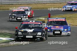 26.06.2005 Oschersleben, Germany,  Laurent Aiello (FRA), Opel Performance Center, Opel Vectra GTS V8, leads Mattias Ekström (SWE), Audi Sport Team Abt Sportsline, Audi A4 DTM, Tom Kristensen (DNK), Audi Sport Team Abt, Audi A4 DTM, Frank Stippler (GER), Audi Sport Team Joest, Audi A4 DTM and Marcel Fässler (SUI), Opel Performance Center, Opel Vectra GTS V8 - DTM 2005 at Motopark Oschersleben (Deutsche Tourenwagen Masters)