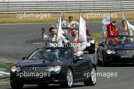 26.06.2005 Oschersleben, Germany,  Driver parade, with Gary Paffett (GBR), DaimlerChrysler Bank AMG-Mercedes, Portrait and Bernd Schneider (GER), Vodafone AMG-Mercedes, Portrait - DTM 2005 at Motopark Oschersleben (Deutsche Tourenwagen Masters)