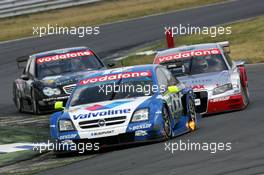 26.06.2005 Oschersleben, Germany,  Manuel Reuter (GER), Opel Performance Center, Opel Vectra GTS V8, leads Tom Kristensen (DNK), Audi Sport Team Abt, Audi A4 DTM and Mika Häkkinen (FIN), Sport Edition AMG-Mercedes, AMG-Mercedes C-Klasse - DTM 2005 at Motopark Oschersleben (Deutsche Tourenwagen Masters)