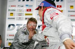 14.05.2005 Francorchamps, Belgium,  Mattias Ekström (SWE), Audi Sport Team Abt Sportsline (right), congratulates Mika Häkkinen (FIN), Sport Edition AMG-Mercedes, Portrait, with being faster - DTM 2005 at Spa Francorchamps, Belgium (Deutsche Tourenwagen Masters)