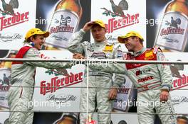 15.05.2005 Francorchamps, Belgium,  Podium, Mattias Ekström (SWE), Audi Sport Team Abt Sportsline, Portrait (2nd, right), and Tom Kristensen (DNK), Audi Sport Team Abt, Portrait (3rd, right), congratulate each other. Center: Mika Häkkinen (FIN), Sport Edition AMG-Mercedes, Portrait (1st) - DTM 2005 at Spa Francorchamps, Belgium (Deutsche Tourenwagen Masters)