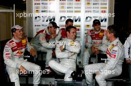 27.08.2005 Zandvoort, The Netherlands,  Bernd Schneider (GER), Vodafone AMG-Mercedes, Portrait, making jokes with the other Top 10 drivers after securing pole position - DTM 2005 at Circuit Park Zandvoort (Deutsche Tourenwagen Masters)