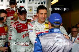 27.08.2005 Zandvoort, The Netherlands,  Other drivers congratulate Bernd Schneider (GER), Vodafone AMG-Mercedes, Portrait, with his pole position - DTM 2005 at Circuit Park Zandvoort (Deutsche Tourenwagen Masters)