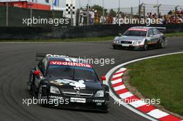 28.08.2005 Zandvoort, The Netherlands,  Laurent Aiello (FRA), Opel Performance Center, Opel Vectra GTS V8, leads Pierre Kaffer (GER), Audi Sport Team Joest Racing, Audi A4 DTM - DTM 2005 at Circuit Park Zandvoort (Deutsche Tourenwagen Masters)