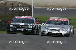 28.08.2005 Zandvoort, The Netherlands,  A duel between Laurent Aiello (FRA), Opel Performance Center, Opel Vectra GTS V8 (left) and Jean Alesi (FRA), AMG-Mercedes, AMG-Mercedes C-Klasse (right), which ended in the tyre barrier for the latter - DTM 2005 at Circuit Park Zandvoort (Deutsche Tourenwagen Masters)