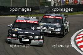 28.08.2005 Zandvoort, The Netherlands,  Allan McNish (GBR), Audi Sport Team Abt, Audi A4 DTM, leads Mika Häkkinen (FIN), Sport Edition AMG-Mercedes, AMG-Mercedes C-Klasse - DTM 2005 at Circuit Park Zandvoort (Deutsche Tourenwagen Masters)
