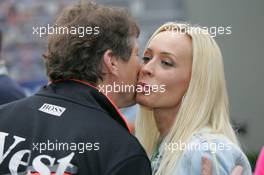 04.03.2005 Melbourne, Australia, Cora Schumacher, GER, Wife of Ralf Schumacher kisses Mario Illien, GBR, Mercedes, Illmor, Chief - Friday, March, Formula 1 World Championship, Rd 1, Australian Grand Prix