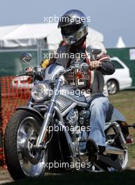 03.03.2005 Melbourne, Australia, Vodafone Event (Beach Volleyball) at the St. Kilda Beach - Michael Schumacher, GER, Ferrari on a Harley Davidson V-Rod - Thursday, March, Formula 1 World Championship, Rd 1, Australian Grand Prix