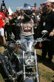 03.03.2005 Melbourne, Australia, Vodafone Event (Beach Volleyball) at the St. Kilda Beach - Michael Schumacher, GER, Ferrari on a Harley Davidson V-Rod - Thursday, March, Formula 1 World Championship, Rd 1, Australian Grand Prix