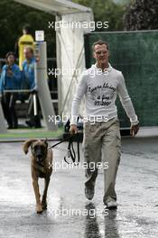 09.09.2005 Spa Francorchamps, Belgium,  Michael Schumacher, GER, Ferrari arrives at the circuit with his dog Shiva - September, Formula 1 World Championship, Rd 16, Belgian Grand Prix, Friday