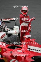 11.09.2005 Spa Francorchamps, Belgium,  Michael Schumacher, GER, Scuderia Ferrari Marlboro, F2005, Action, Track and Takuma Sato, JPN,  BAR Honda crashed at turn 1 - September, Formula 1 World Championship, Rd 16, Belgian Grand Prix, Sunday Race