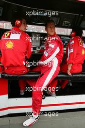 10.09.2005 Spa Francorchamps, Belgium,  Michael Schumacher (GER), Scuderia Ferrari Marlboro, Portrait, at the pitwall - September, Formula 1 World Championship, Rd 16, Belgian Grand Prix, Saturday Qualifying