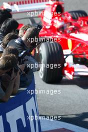 10.09.2005 Spa Francorchamps, Belgium,  Michael Schumacher, GER, Ferrari passes the photographers - September, Formula 1 World Championship, Rd 16, Belgian Grand Prix, Saturday Practice