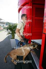 08.09.2005 Spa-Francorchamps, Belgium, Michael Schumacher, GER, Ferrari arrives at the track with his dog Shiva - September, Formula 1 World Championship, Rd 16, Belgian Grand Prix